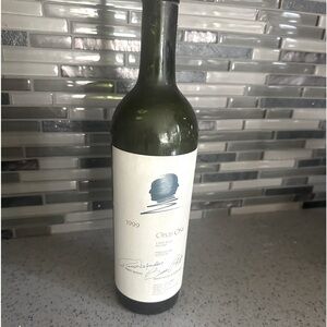 1999 empty Opus One wine bottle no cork